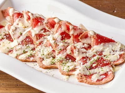 松尾ジンギスカン東京エリア直営店 新メニュー「自社工場特製ラムのたたきカルパッチョ」のご紹介